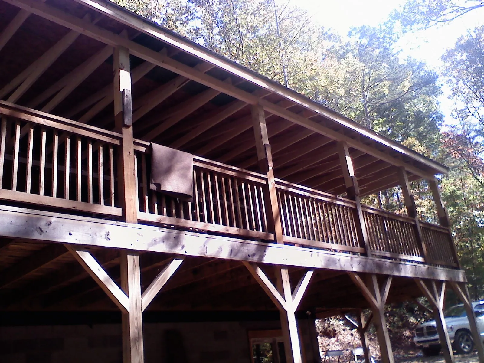 Timber framing under a new elevated porch and deck — Roof Leak Repair in Toulon by Roofing Brothers
